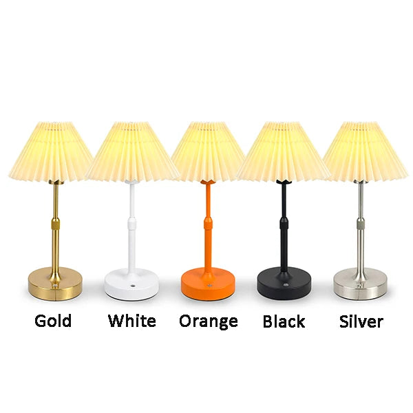 Nella lamps with pleated shades in five base colors