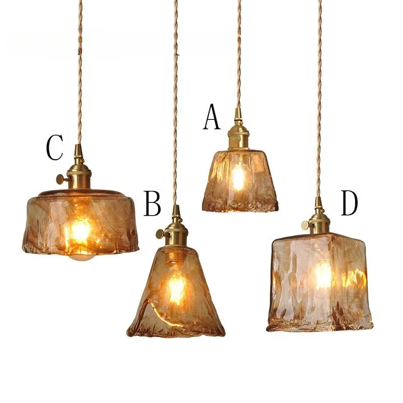 Four available Aurelia amber marbled glass pendant shade forms